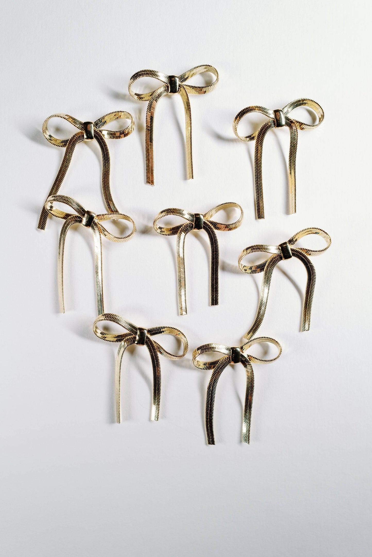 St Armands Designs of Sarasota - Mini Gold Duster Bow Holiday Earrings