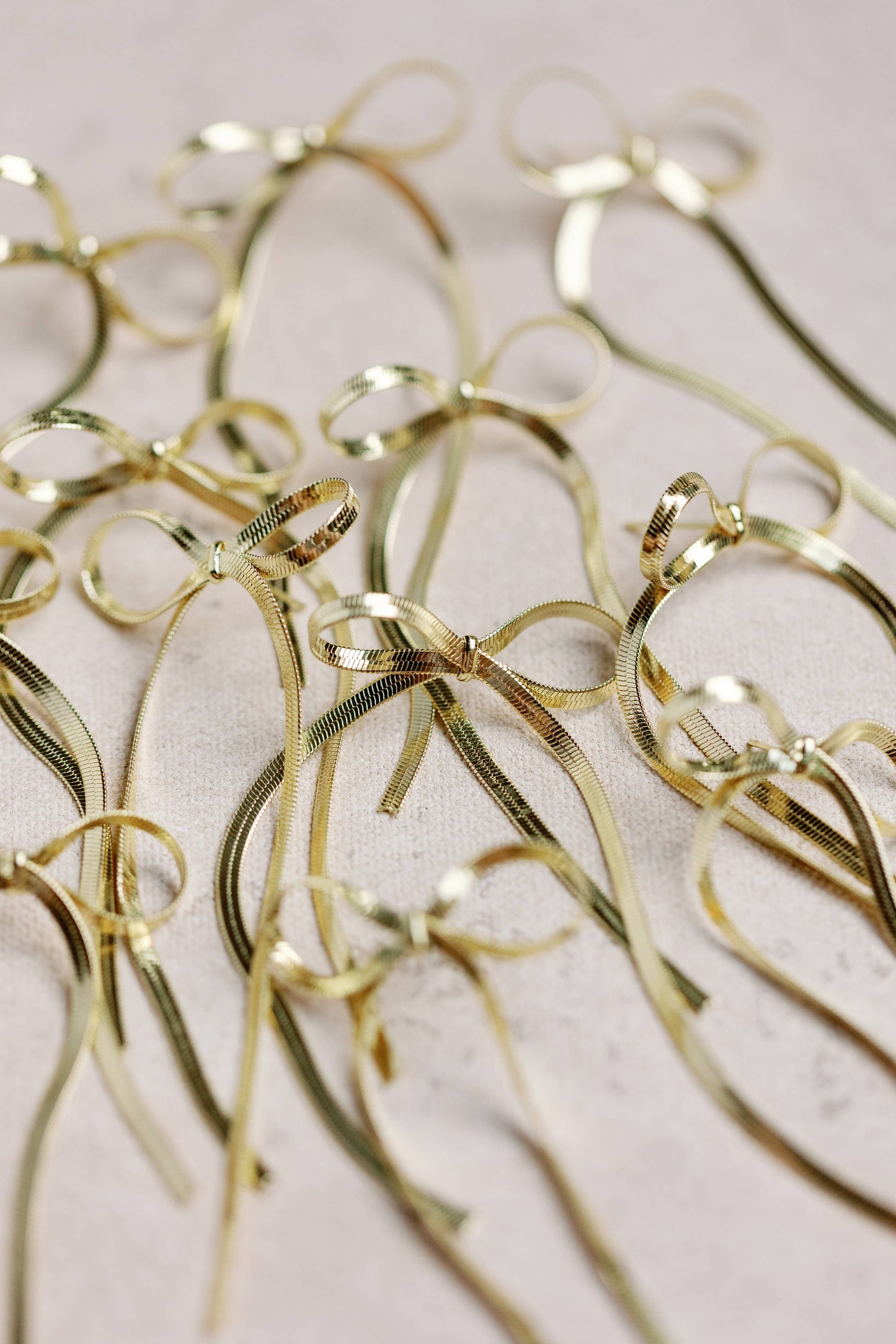 St Armands Designs of Sarasota - Maxi Gold Duster Bow Holiday Statement Earrings