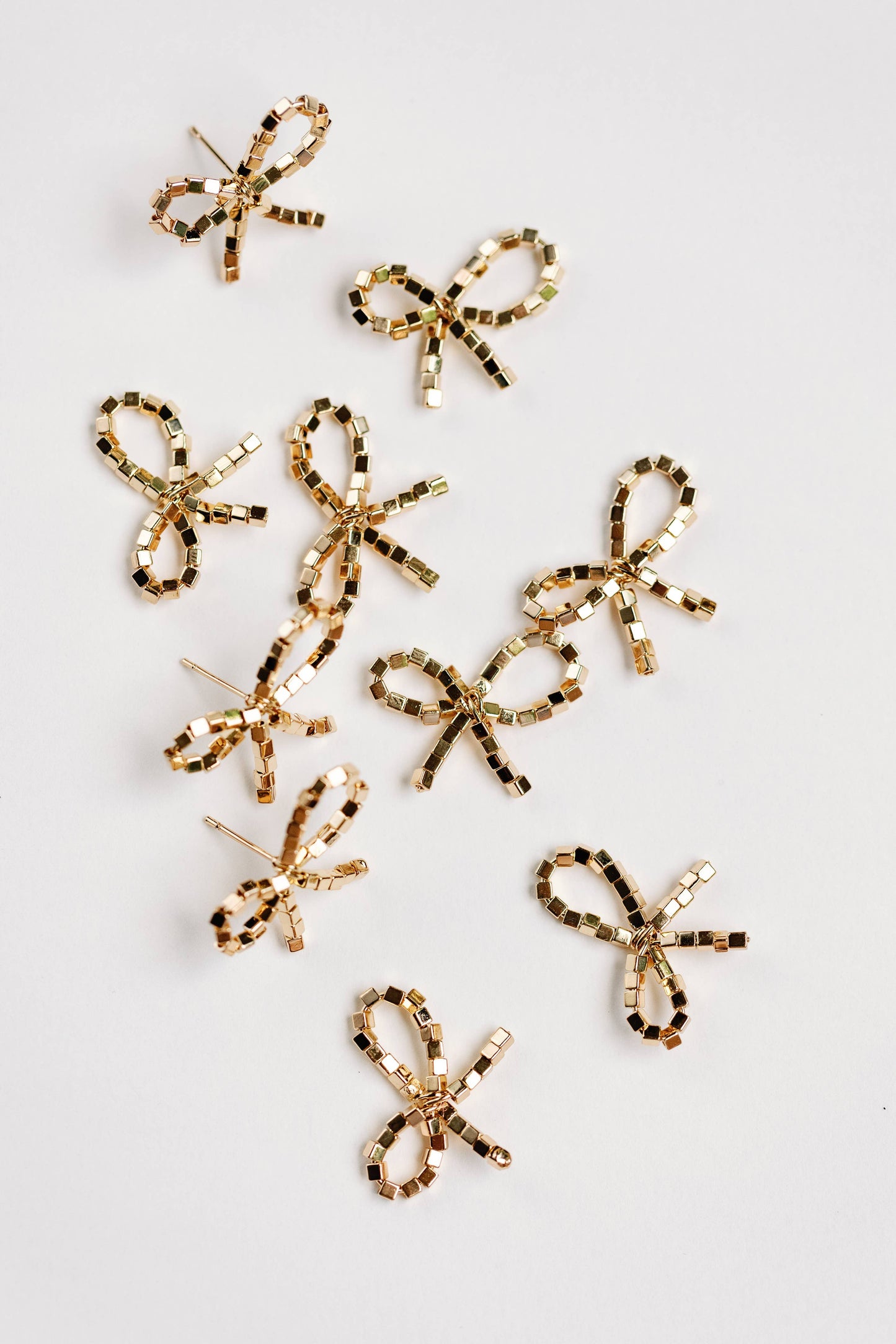 St Armands Designs of Sarasota - Mini Gold Beaded Bow Holiday Statement Earrings