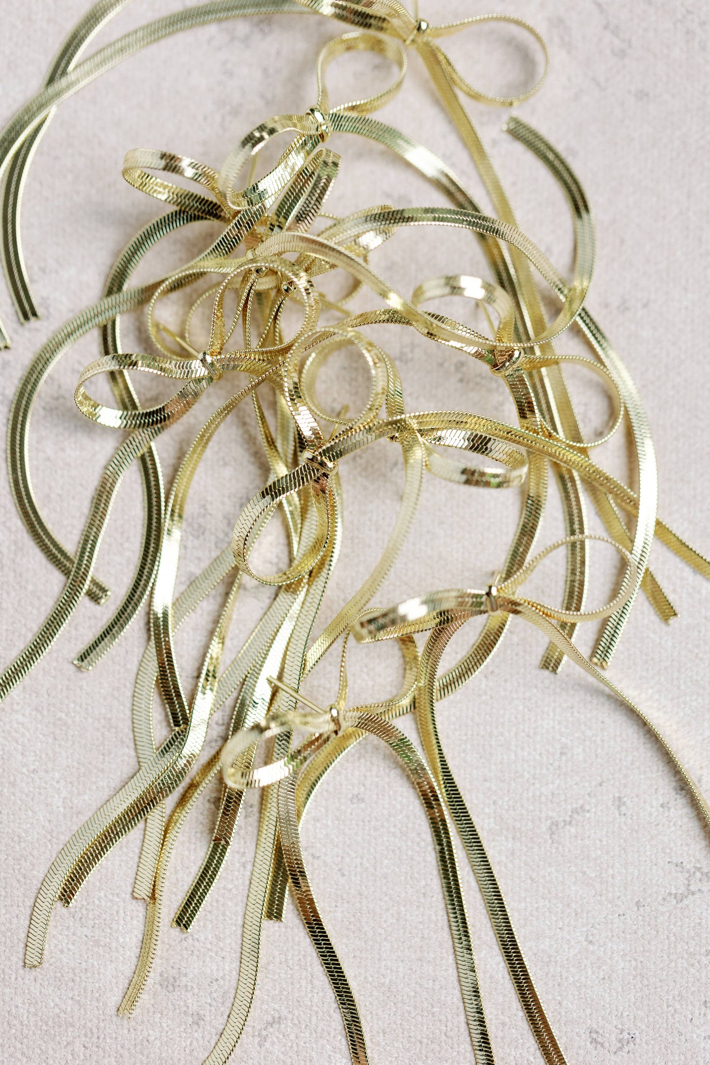 St Armands Designs of Sarasota - Maxi Gold Duster Bow Holiday Statement Earrings