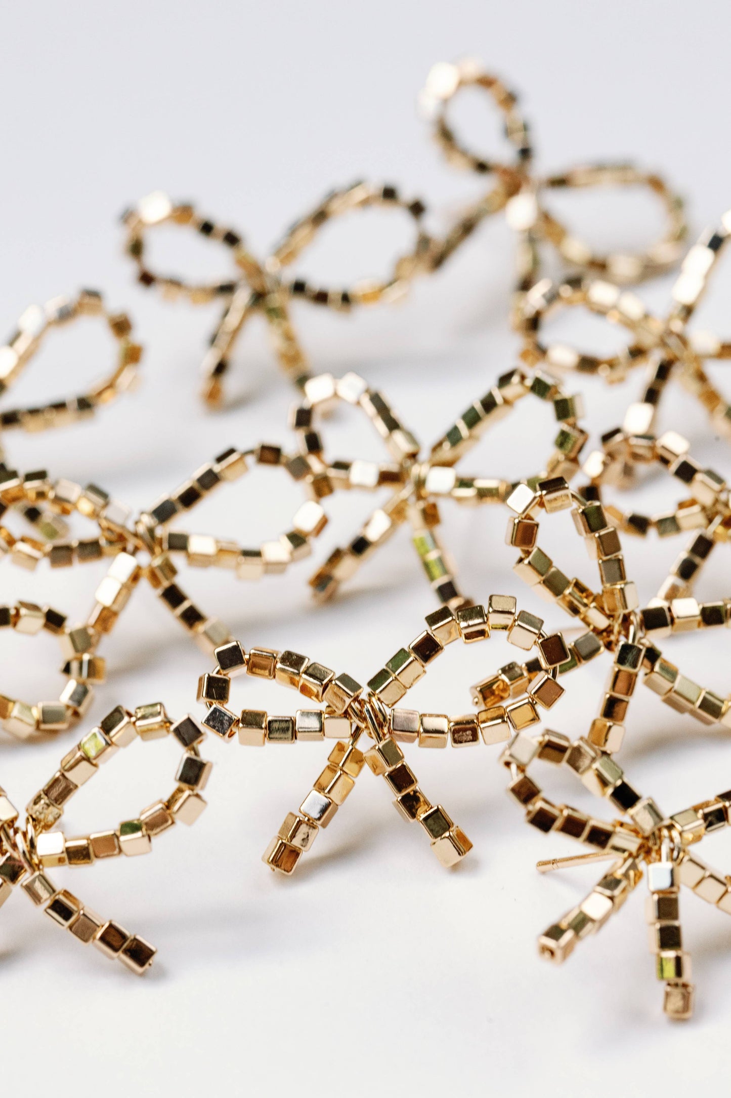 St Armands Designs of Sarasota - Mini Gold Beaded Bow Holiday Statement Earrings
