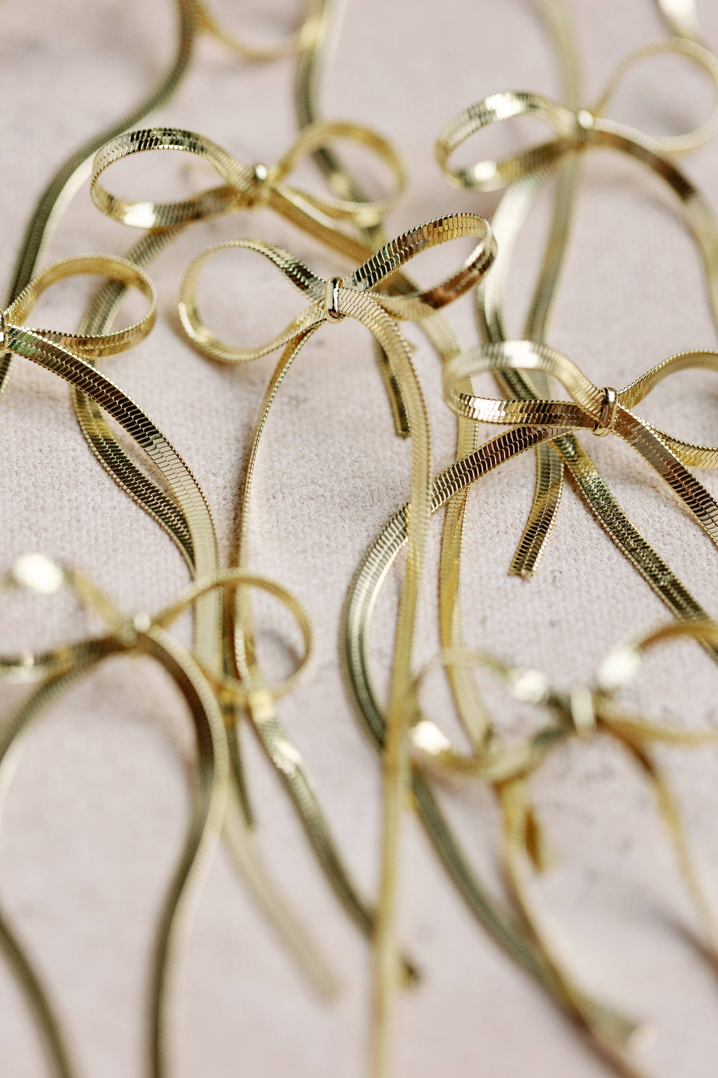 St Armands Designs of Sarasota - Maxi Gold Duster Bow Holiday Statement Earrings