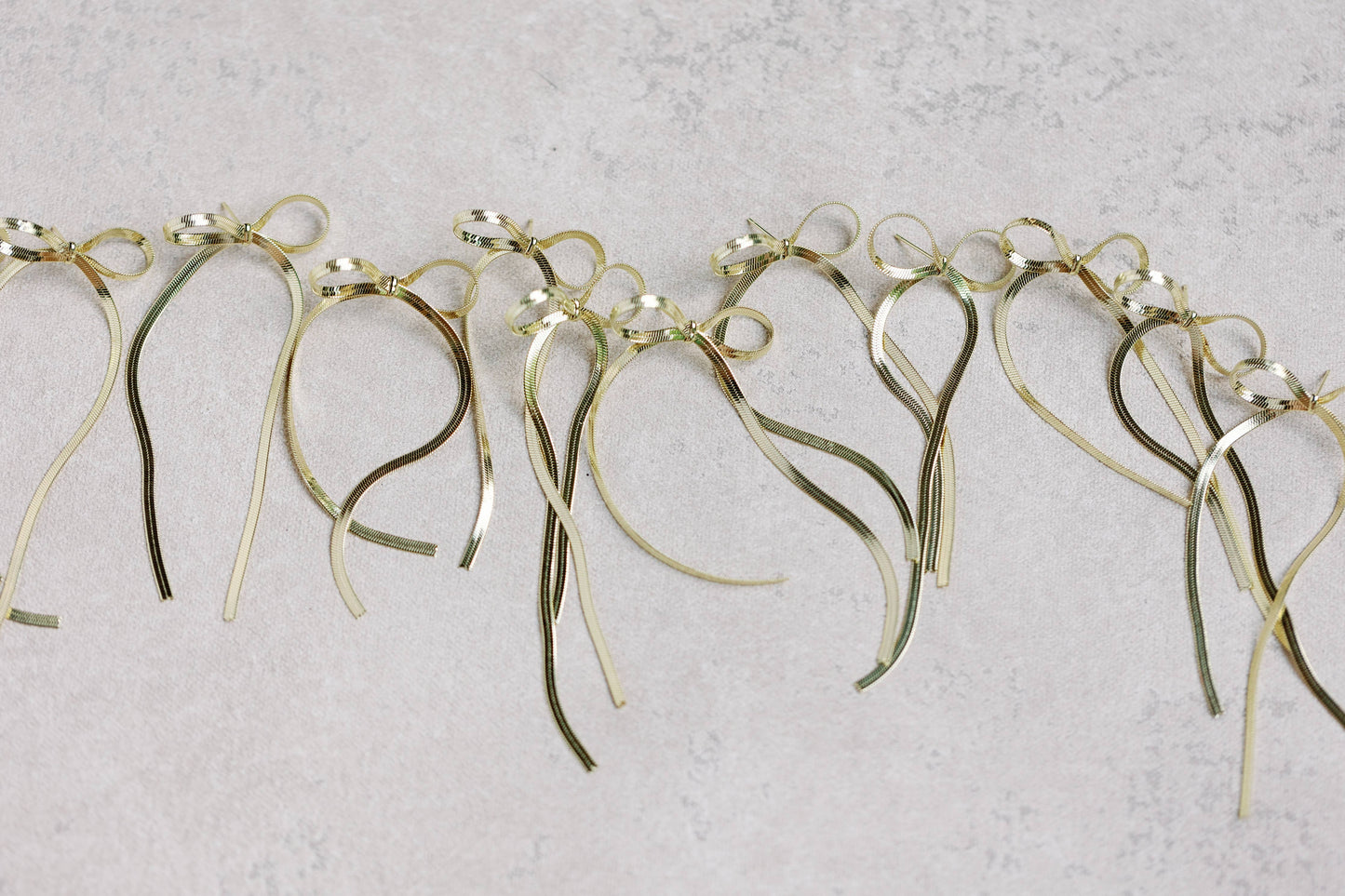 St Armands Designs of Sarasota - Maxi Gold Duster Bow Holiday Statement Earrings